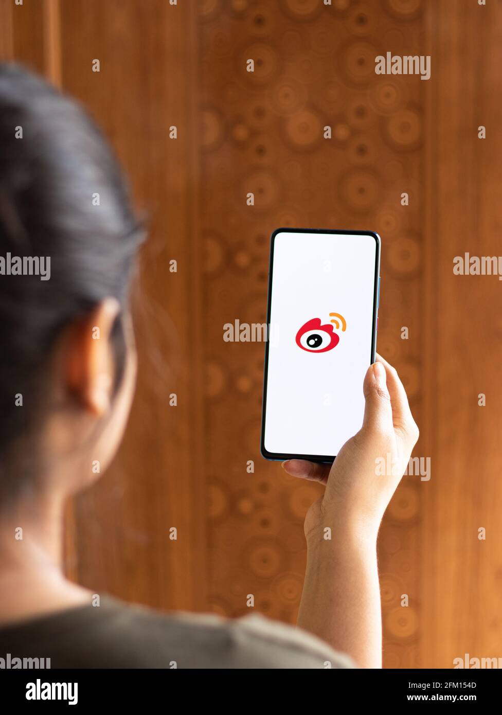 Assam, india - May 04, 2021 : Sina Weibo logo on phone screen stock image. Stock Photo