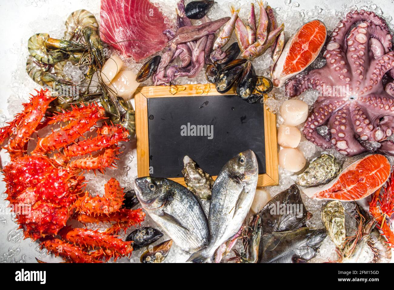 Fresh fish on tray with octopus, shrimp and crab. Stock Photo