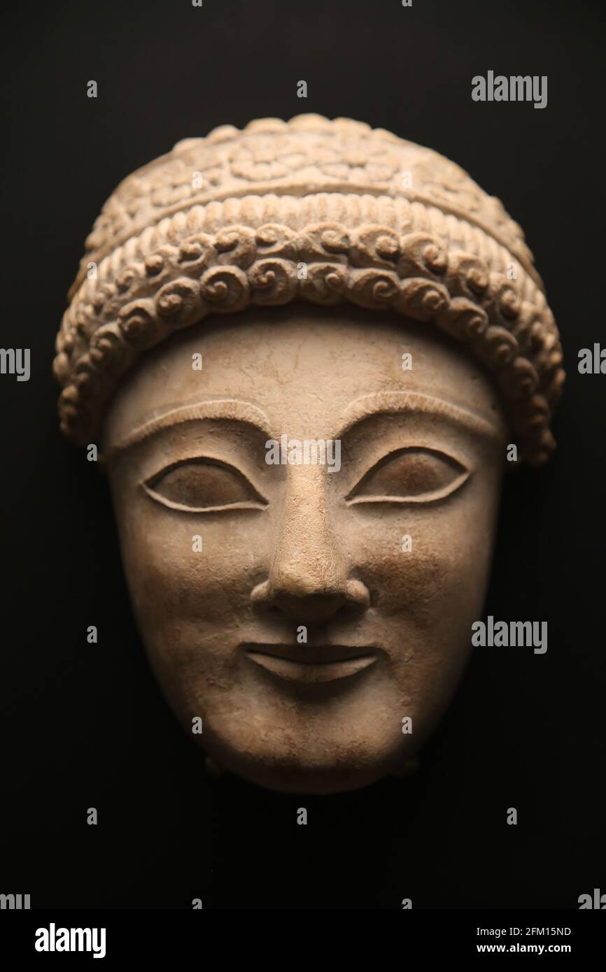 Head of a male worshipper. Sanctuary of Apollo-Reshef, Idalion, Cyprus. About 510 BC. Limestone. British Museum. London. Stock Photo