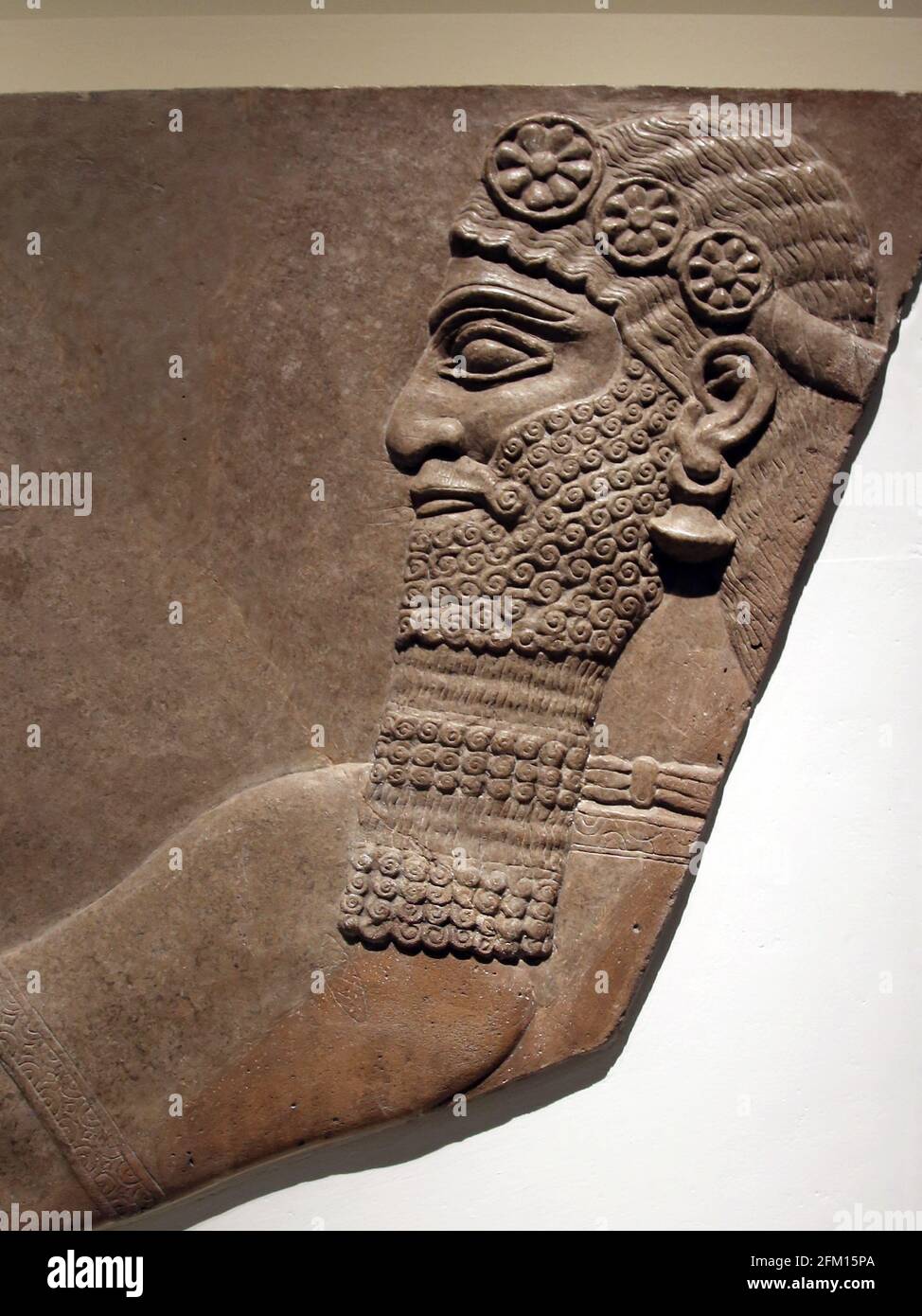 Wall panel. Relief. Protective spirit in relief. Neo-Assyrian. North West Palace, Nimrud, Iraq. 900-700BC. Stock Photo