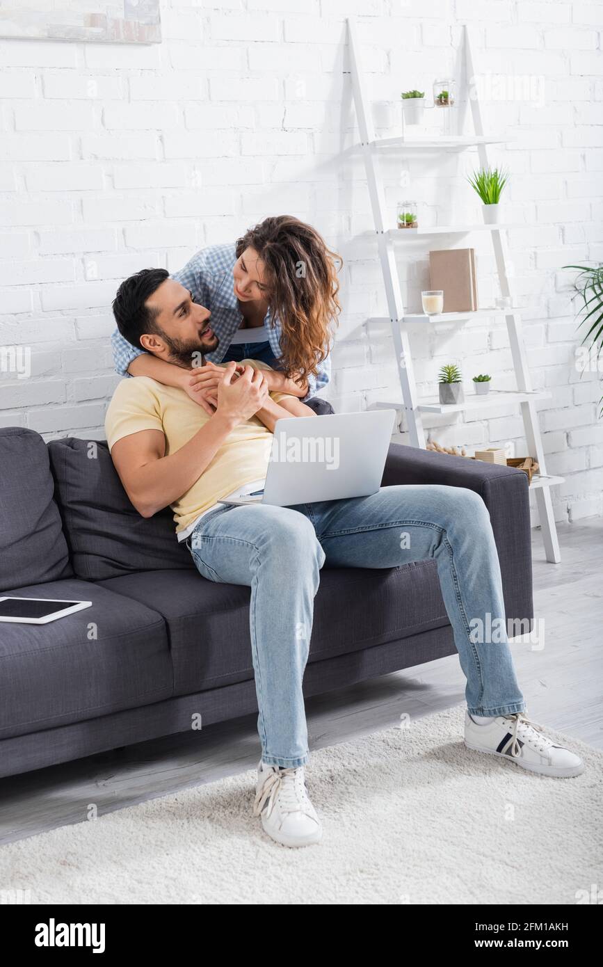 Arab man sitting in sofa hi-res stock photography and images - Alamy