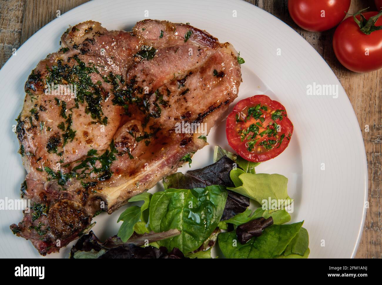 Recipe for grilled pork chop, maple syrup and fresh cilantro marinade