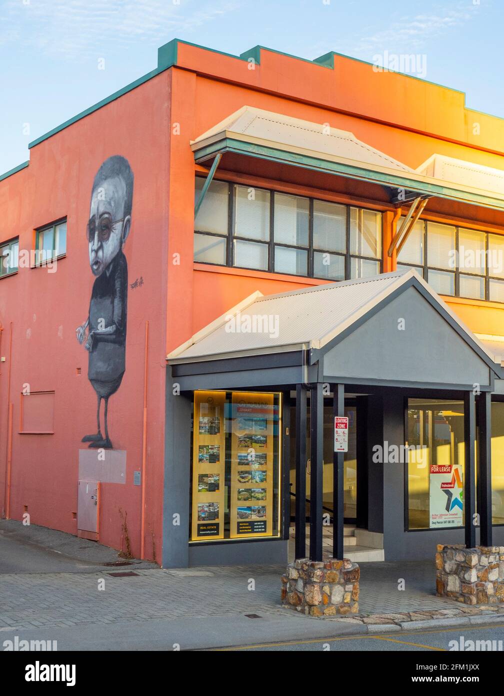 Commercial building with a mural painted on the side of the building in Albany Western Australia Stock Photo