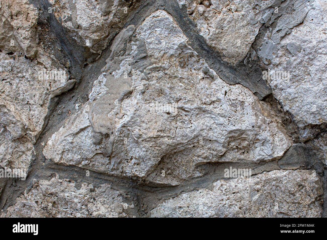Grungy rustic big tiled gray stone background Stock Photo