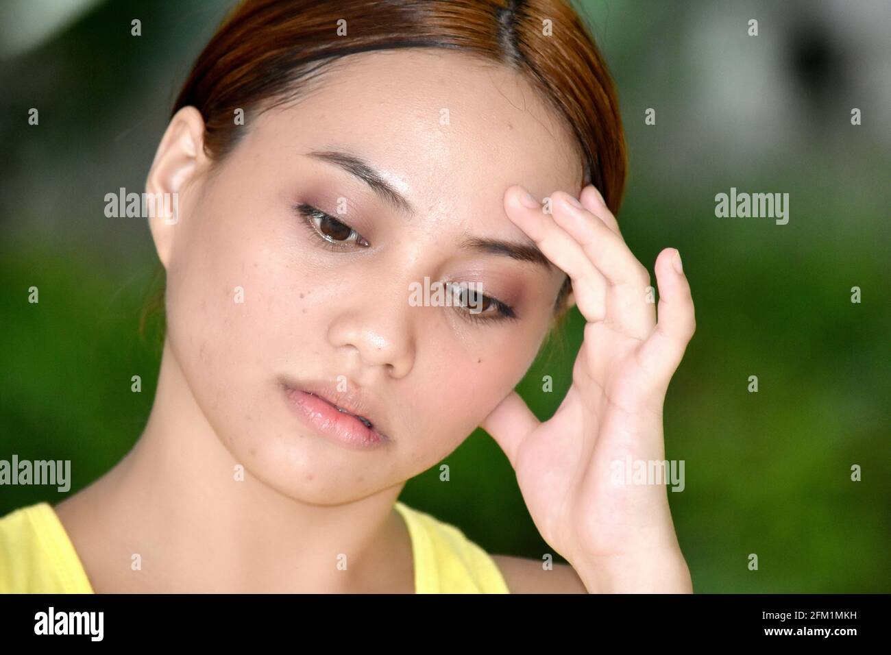 A Stressful Young Female Woman Stock Photo