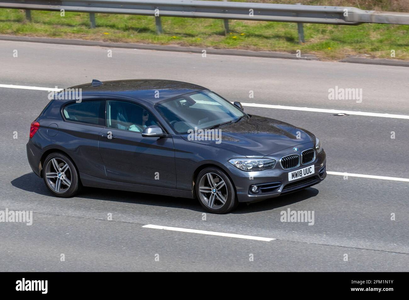 18 Grey Bmw 1i Sport 1998cc Petrol Hatchback Vehicular Traffic Moving Vehicles Cars Vehicle Driving On Uk Roads Motors Motoring On The M6 Motorway Highway Uk Road Network Stock Photo Alamy