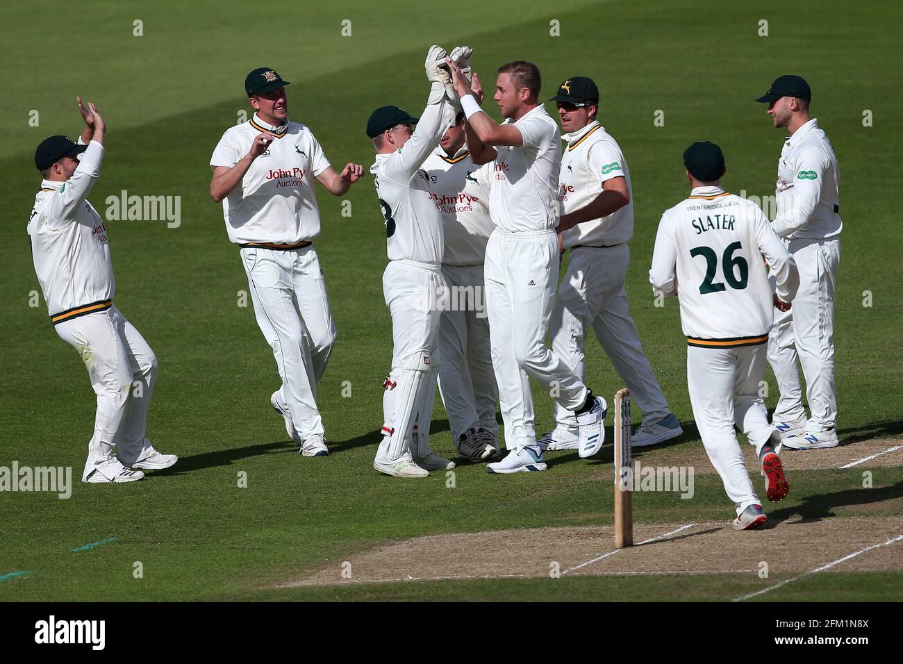 Stuart Broad of Nottinghamshire celebrates with his team mates after taking the wicket of Alastair Cook during Nottinghamshire CCC vs Essex CCC, Specs Stock Photo
