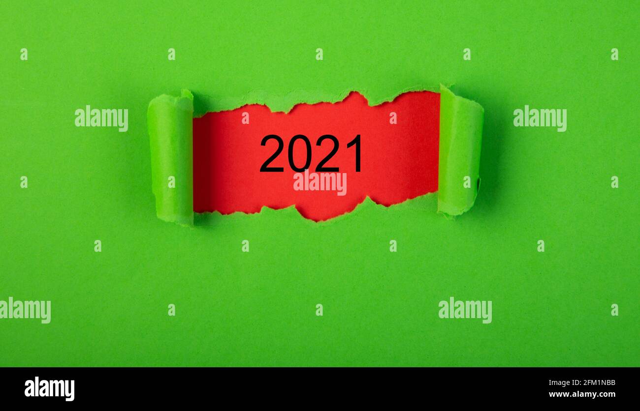 Vision 2021 goal written behind a torn paper Stock Photo - Alamy