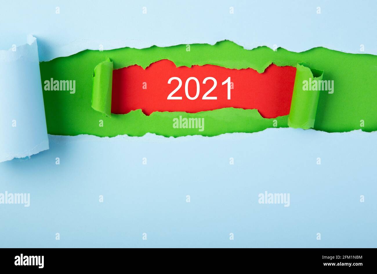 Vision 2021 goal written behind a torn paper Stock Photo - Alamy