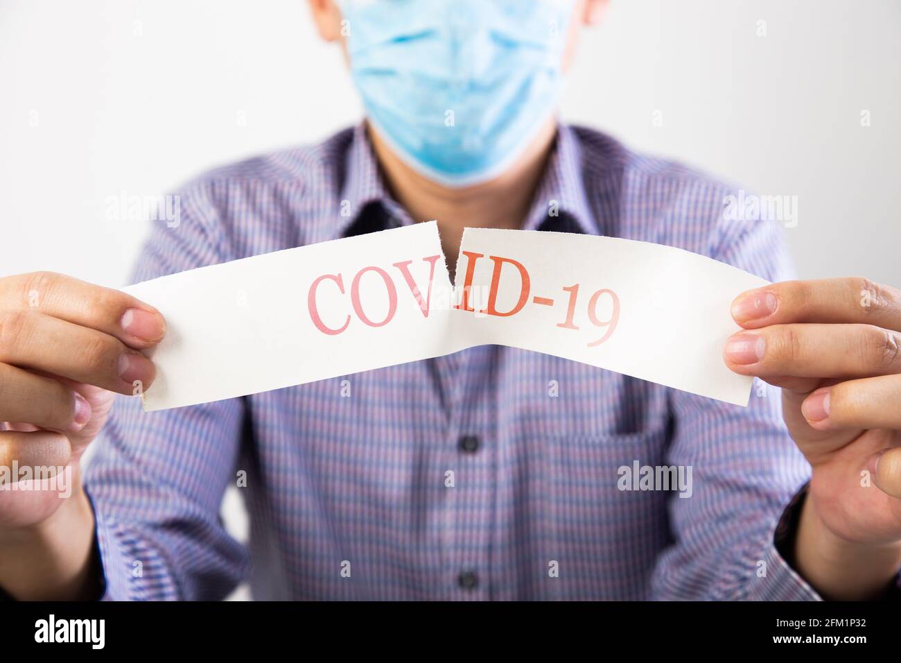 Man and mask and ripping hi-res stock photography and images - Alamy