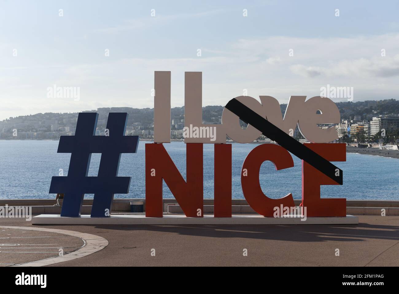 *** STRICTLY NO SALES TO FRENCH MEDIA OR PUBLISHERS - RIGHTS RESERVED ***October 30, 2020 - Nice, France: The logo  #ILoveNice with a black banner in homage to the victims of the islamist attack in Notre-Dame basilica, where an an assailant killed three people in a knife attack. Stock Photo