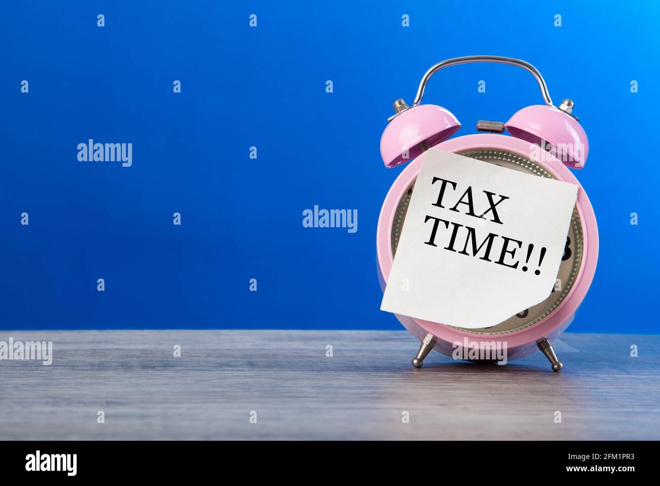 Note Tax Time Tax Concept - A Clock with sticker note written TAX TIME Stock Photo ...