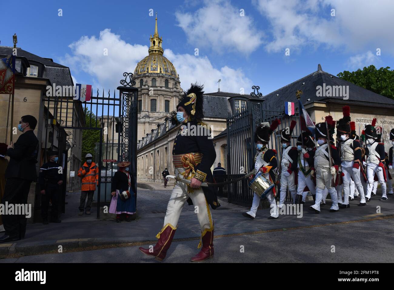 *** STRICTLY NO SALES TO FRENCH MEDIA OR PUBLISHERS - RIGHTS RESERVED ***May 05, 2021 - Paris, France: Reenactors dressed as soldiers of Napoleon's Grande Armee gather in front of the Invalides church, where the French emperor's tomb is located, to mark the bicentenary of his death. Stock Photo