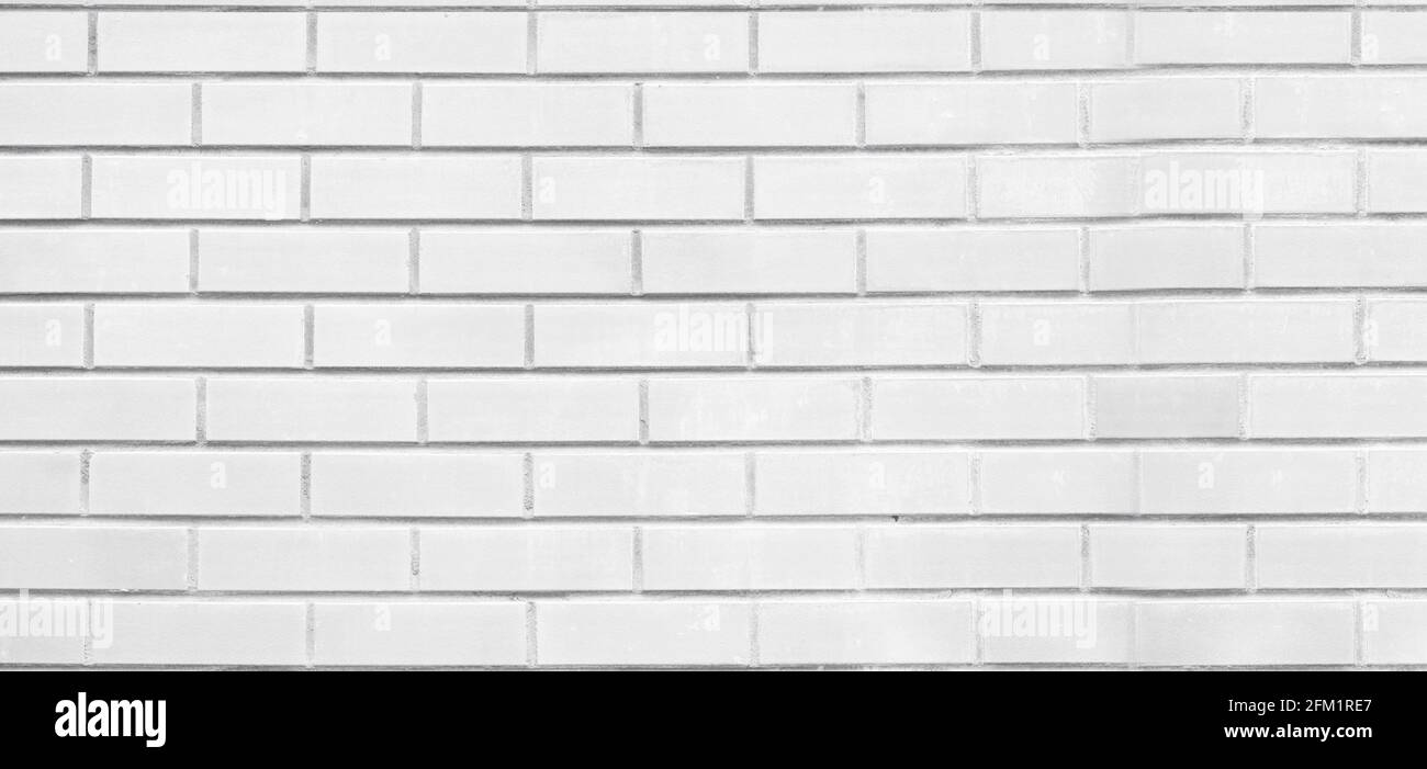 Soft light brick wall, clean smooth blank surface, long picture as background Stock Photo