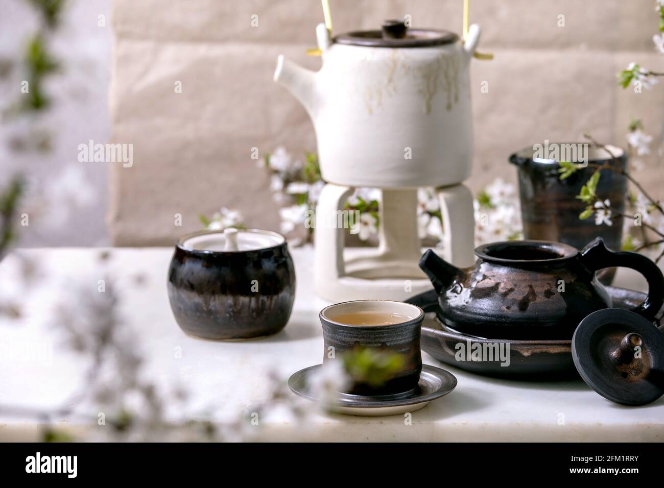 White and black handmade ceramic teapot for tea ceremony Stock Photo Alamy