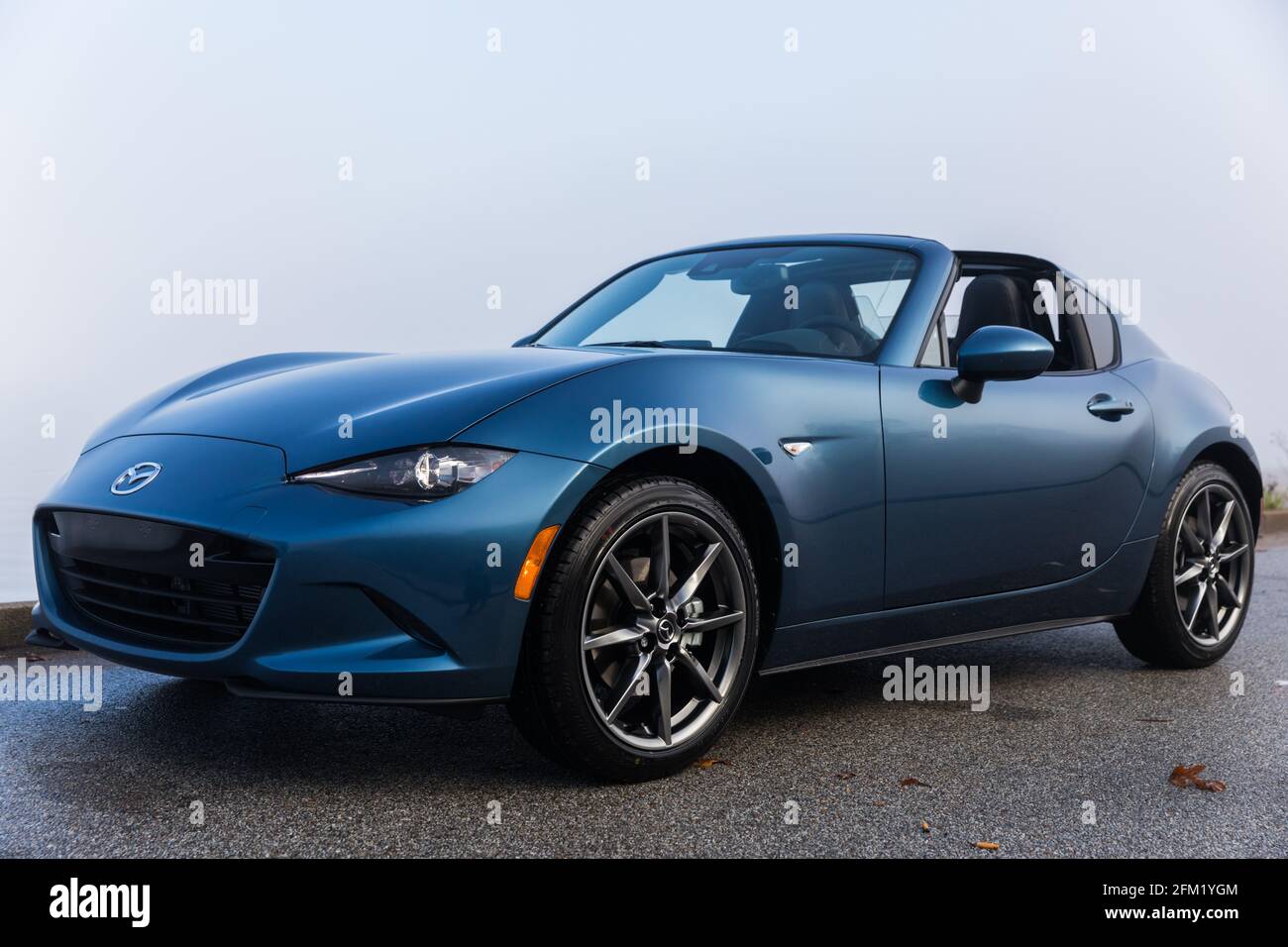 Driver's side view of a new, blue 2020 Mazda MX-5 Miata GT RF Stock