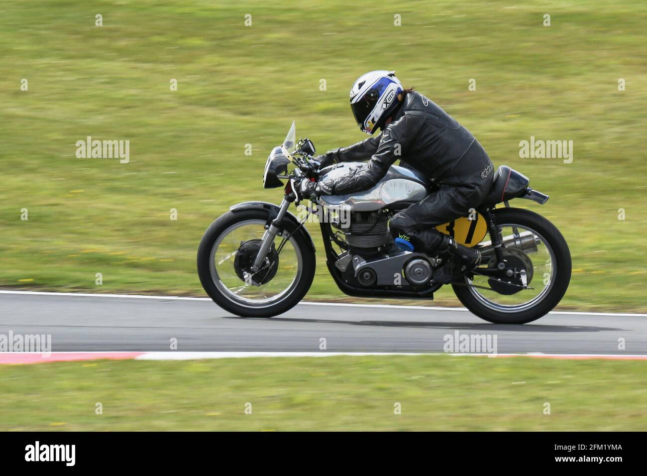 approaches The Gooseneck at the Cadwell Park International Classic in July 2015 Stock Photo