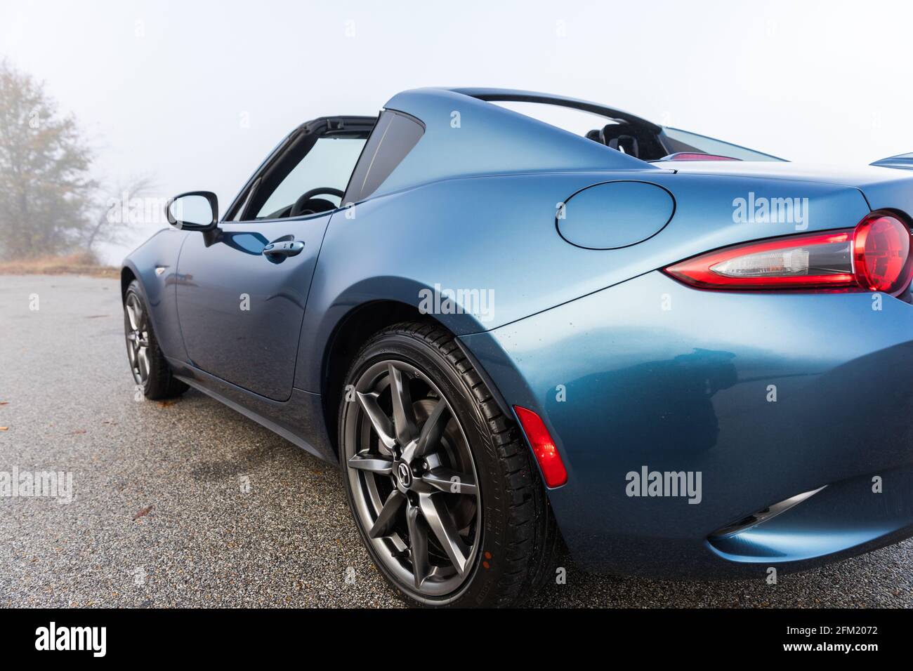 Driver's side view of a new, blue 2020 Mazda MX-5 Miata GT RF Stock Photo