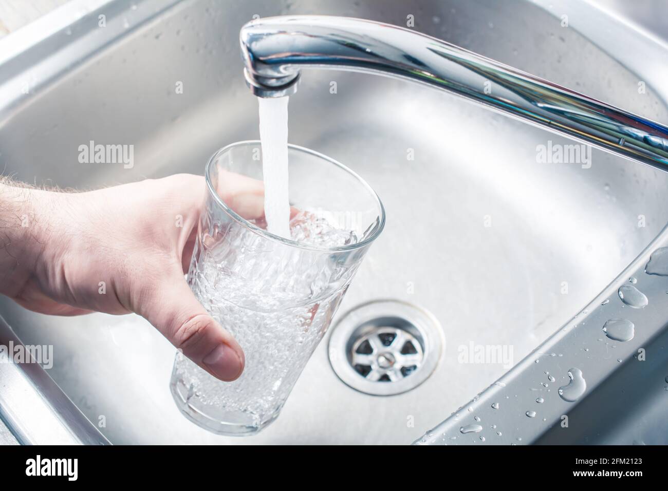Filling glass water from sink hires stock photography and images Alamy