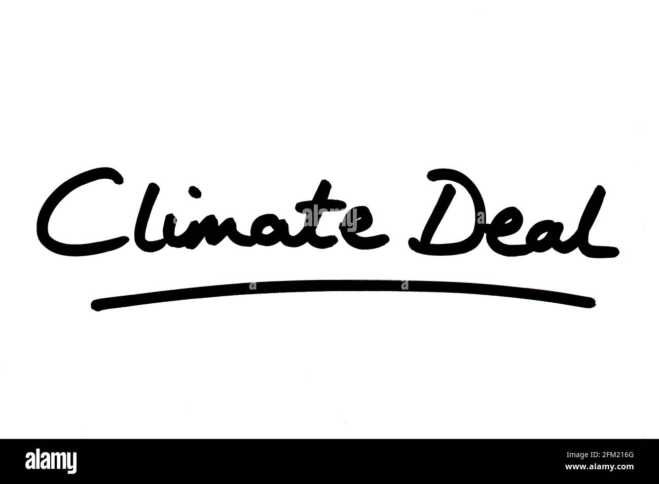 Climate Deal, handwritten on a white background. Stock Photo