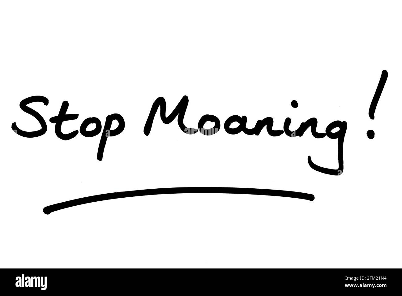 Stop Moaning! handwritten on a white background. Stock Photo
