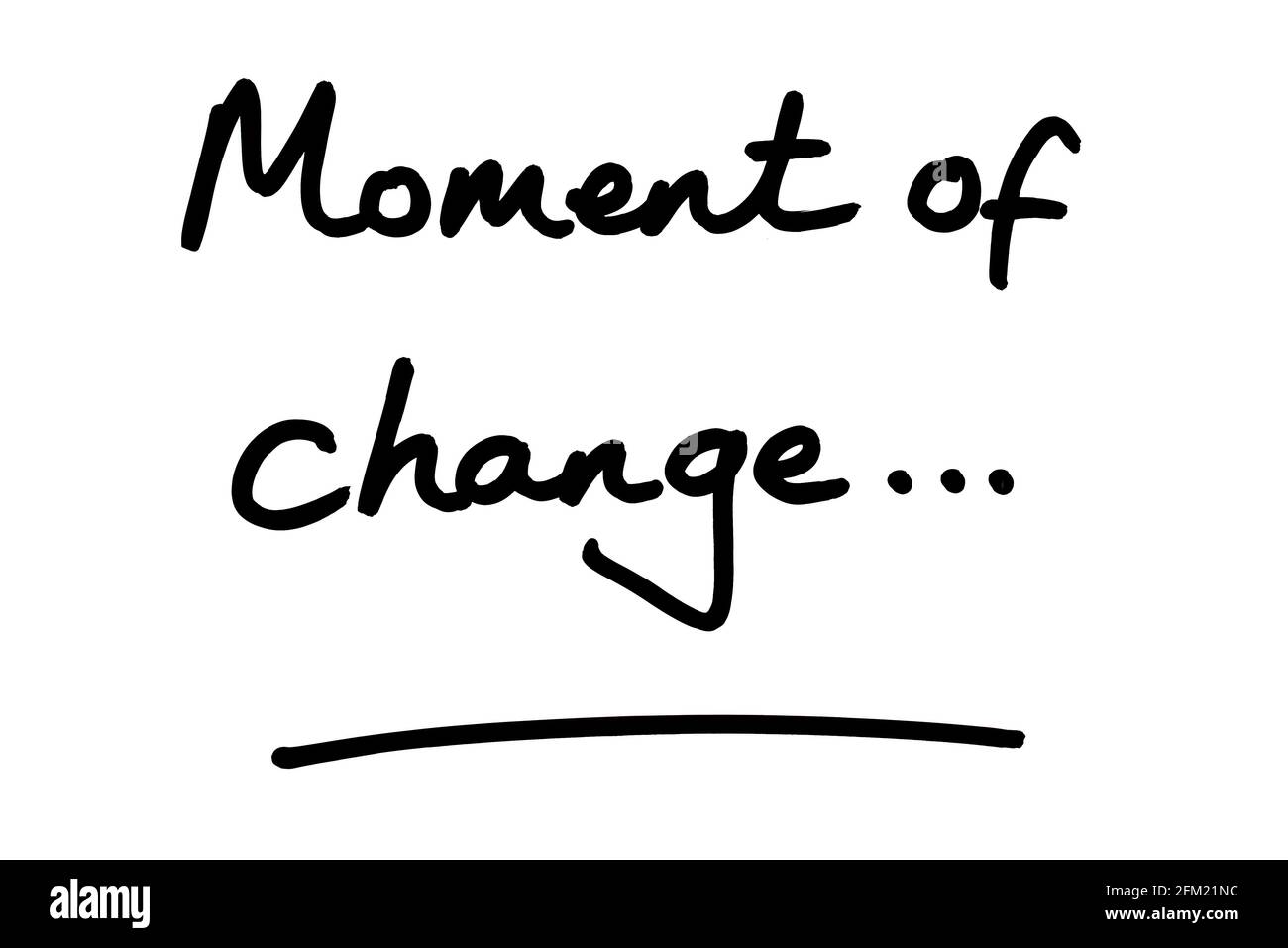 Moment of change… handwritten on a white background. Stock Photo