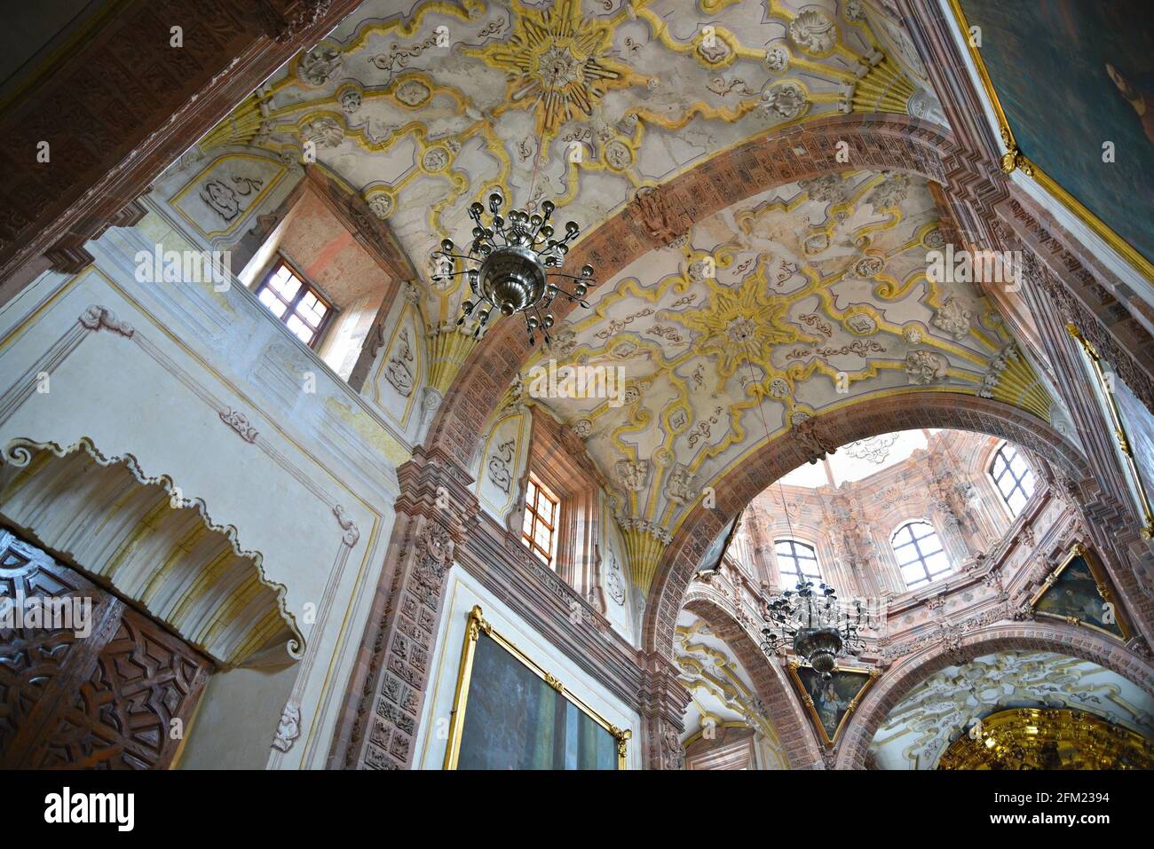 Scenic interior cupola view of the Churrigueresque style Iglesia de la ...