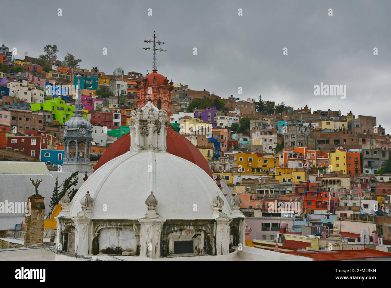 Panoramic view of Guanajuato with the colorful Spanish Colonial architecture and the Baroque style Templo de San Diego in Guanajuato, Mexico. Stock Photo