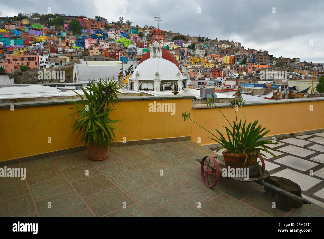 Panoramic view of Guanajuato with the colorful Spanish Colonial architecture and the Baroque style Templo de San Diego in Guanajuato, Mexico. Stock Photo