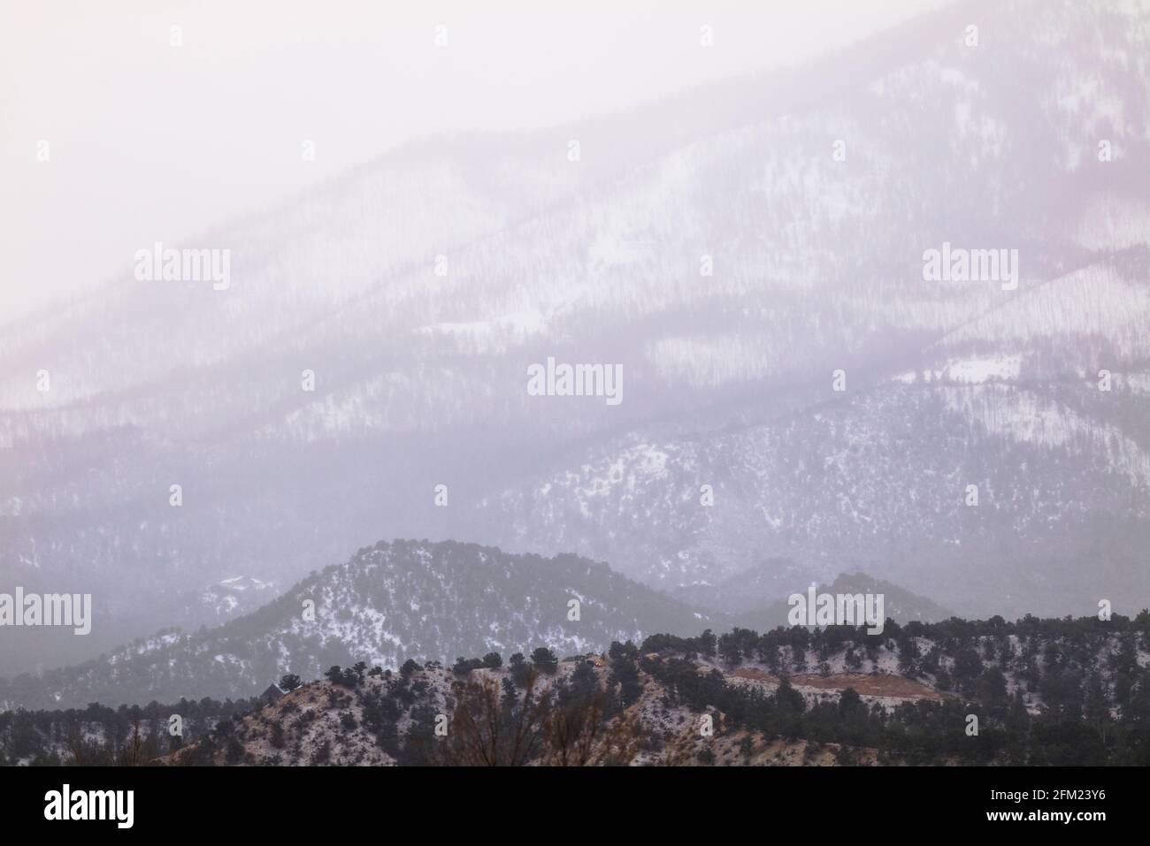 Cloudy winter view of snow covered Methodist Mountain; Sangre de Cristo Range; near Salida; Colorado; USA Stock Photo