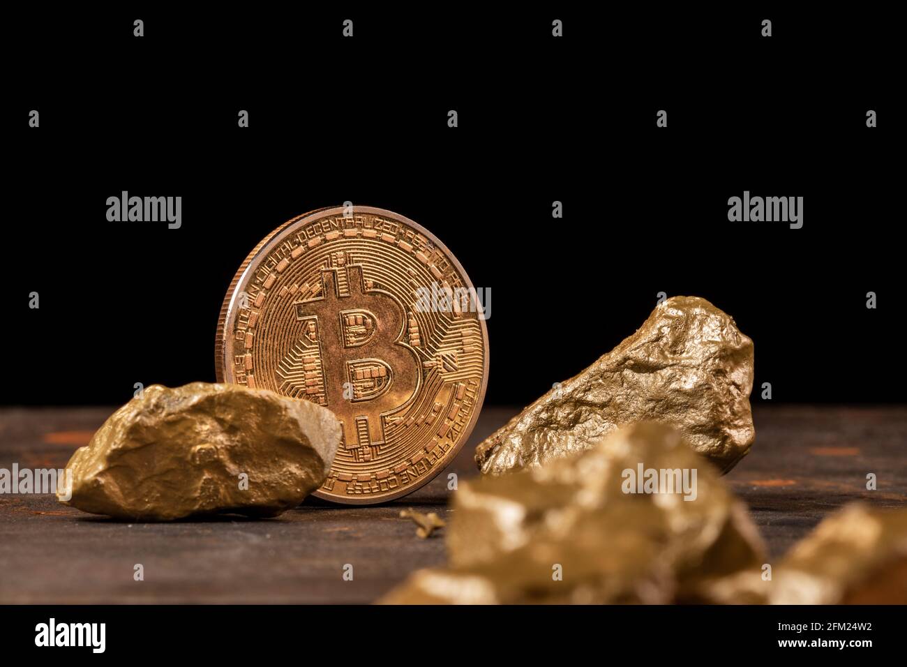 Bitcoin cryptocurrency with gold nuggets. Investment and store of value  concept Stock Photo - Alamy