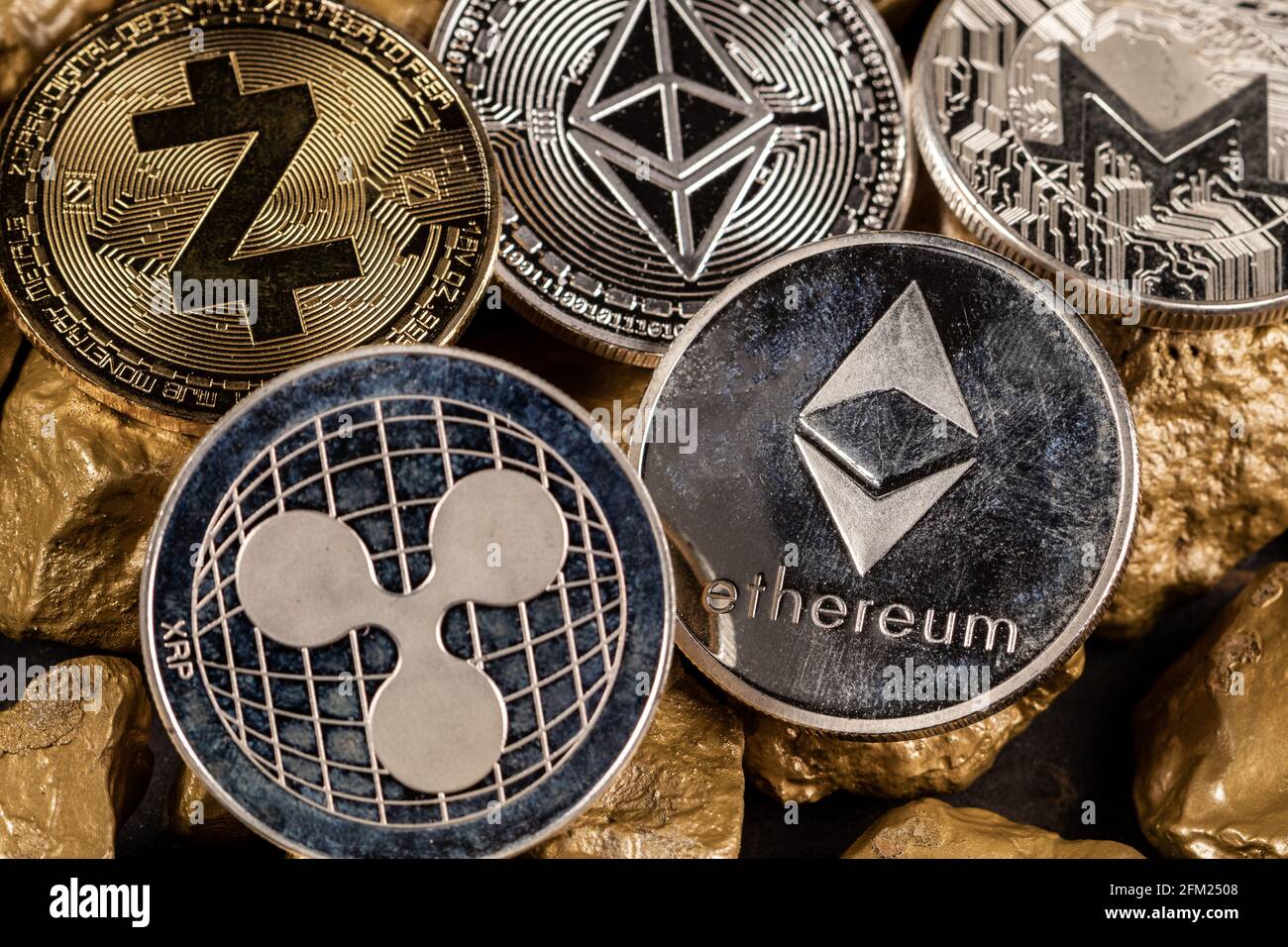 Cryptocurrency altcoins with gold nuggets. Investment and store of value  concept Stock Photo - Alamy
