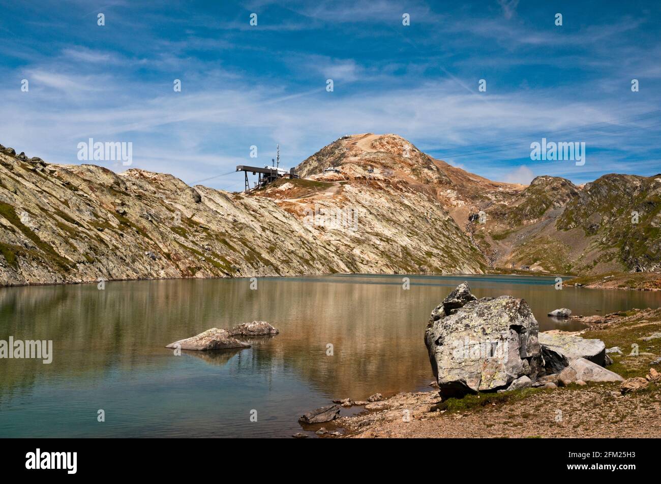 Lac Blanc (2525m) with cable car station (gare 2700) leading to Pic du Lac Blanc (3323m) near Lac Blanc (2525m) with cable car station (gare 2700) leading to Pic du Lac Blanc (3323m) near