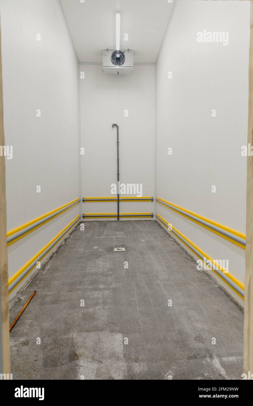 New refrigeration room being arranged and equipped for the meat