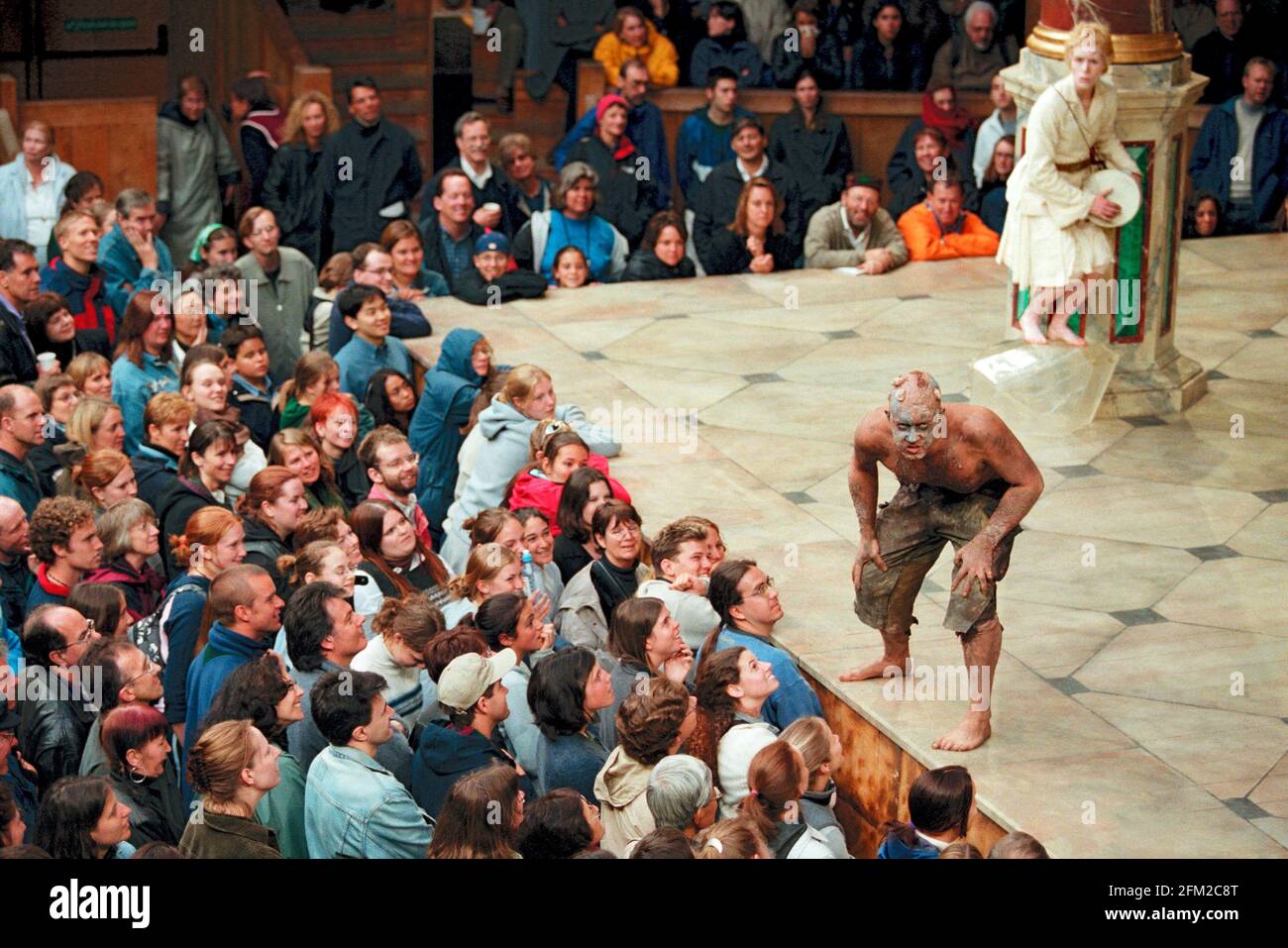 front: Jasper Britton (Caliban)  rear: Geraldine Alexander (Ariel) in THE TEMPEST by Shakespeare at Shakespeare's Globe, London SE1  26/05/2000  Master of Design: Bjanka Ursulov  Master of Music: Nigel Osborne  Master of Play / director: Lenka Udovicki Stock Photo