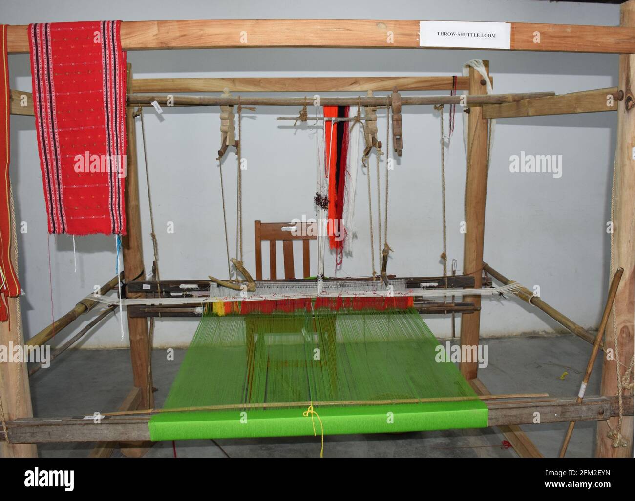 The throw shuttle is a loom in which the shuttle is thrown across the shed by hand. In a fly