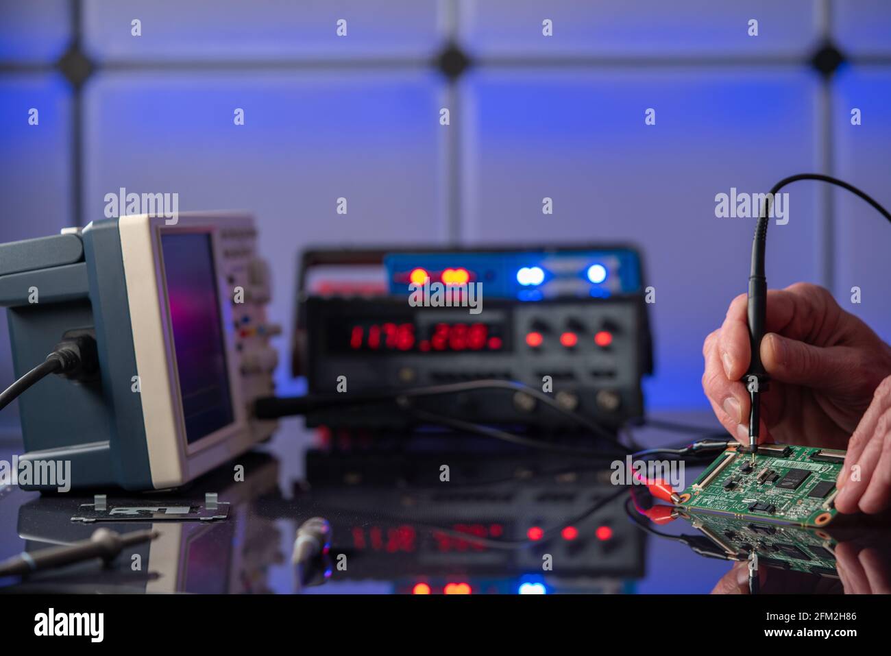 PCB witch microcontroller in electronics laboratory Stock Photo