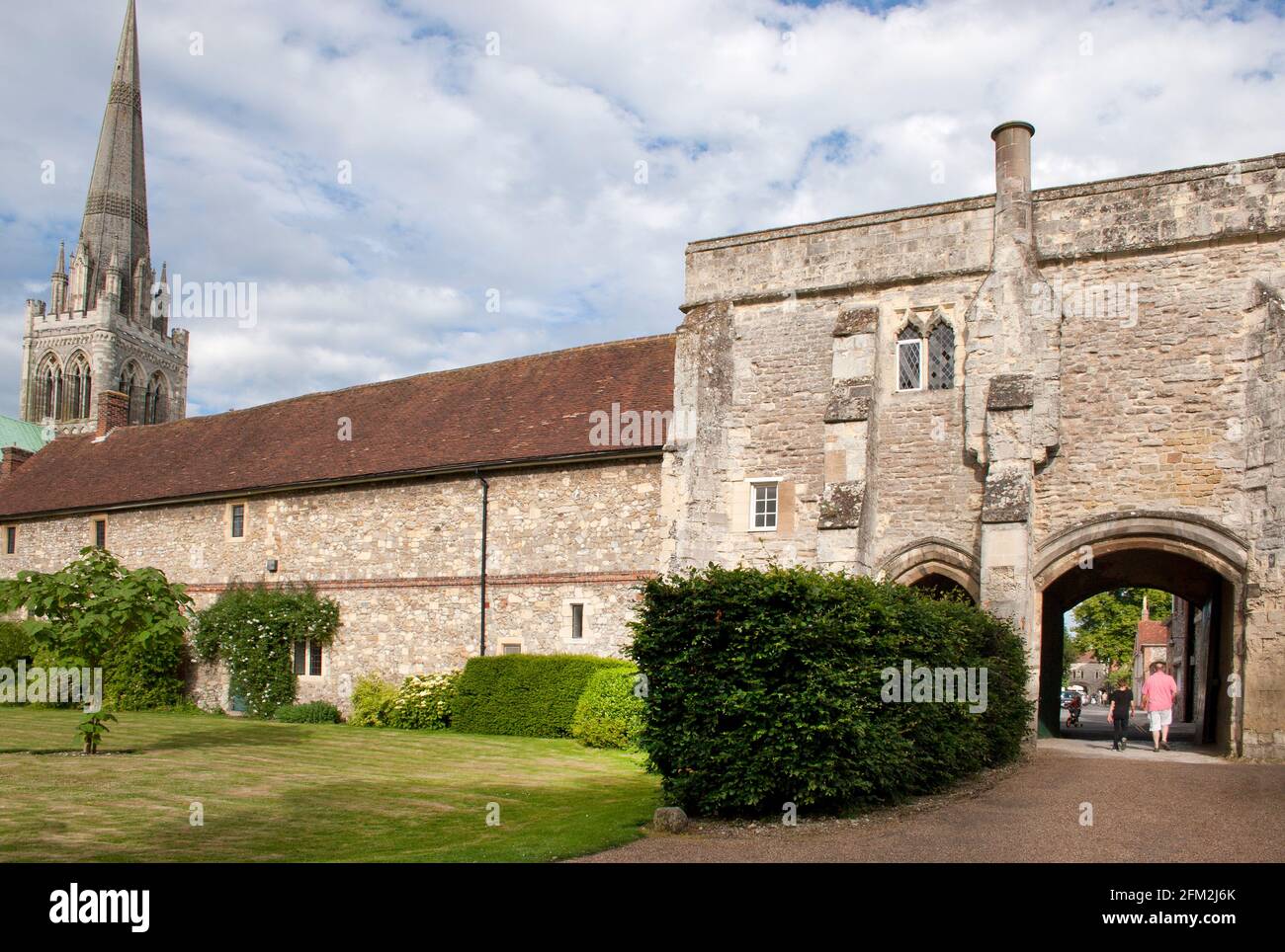 entrance to Bishops Palace from South St with Chichester Cathedral spire in the distance, West Sussex, England Stock Photo