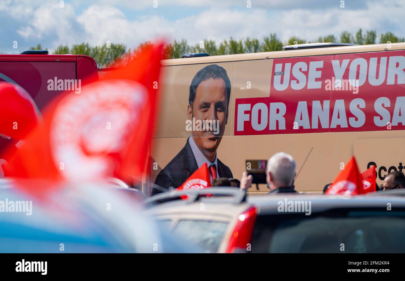 Glasgow, Scotland, UK. 5 May 2021. Scottish Labour Leader Anas Sarwar and former Prime Minister Gordon Brown appear at an eve of polls drive-in campaign rally in Glasgow today. Anas Sarwar image on Labour campaign bus.  Iain Masterton/Alamy Live News Stock Photo