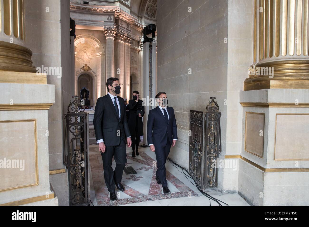 French President Emmanuel Macron (R) speaks with Prince Jean-Christophe ...