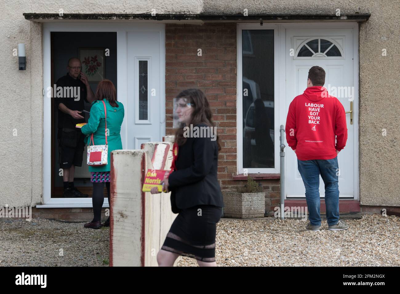 Labour activists canvass voters in Keynsham, Somerset, whilst on the election campaign trail for West of England Mayor Dan Norris. Picture date: Wednesday May 5, 2021. Stock Photo