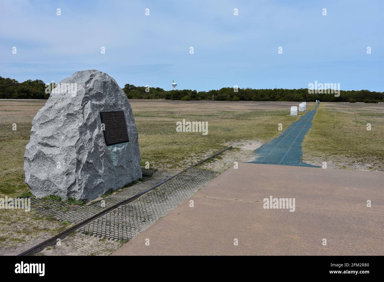 The First Flight Boulder and Markers showing where the first flight was made at the Wright Brothers National Memorial. Stock Photo