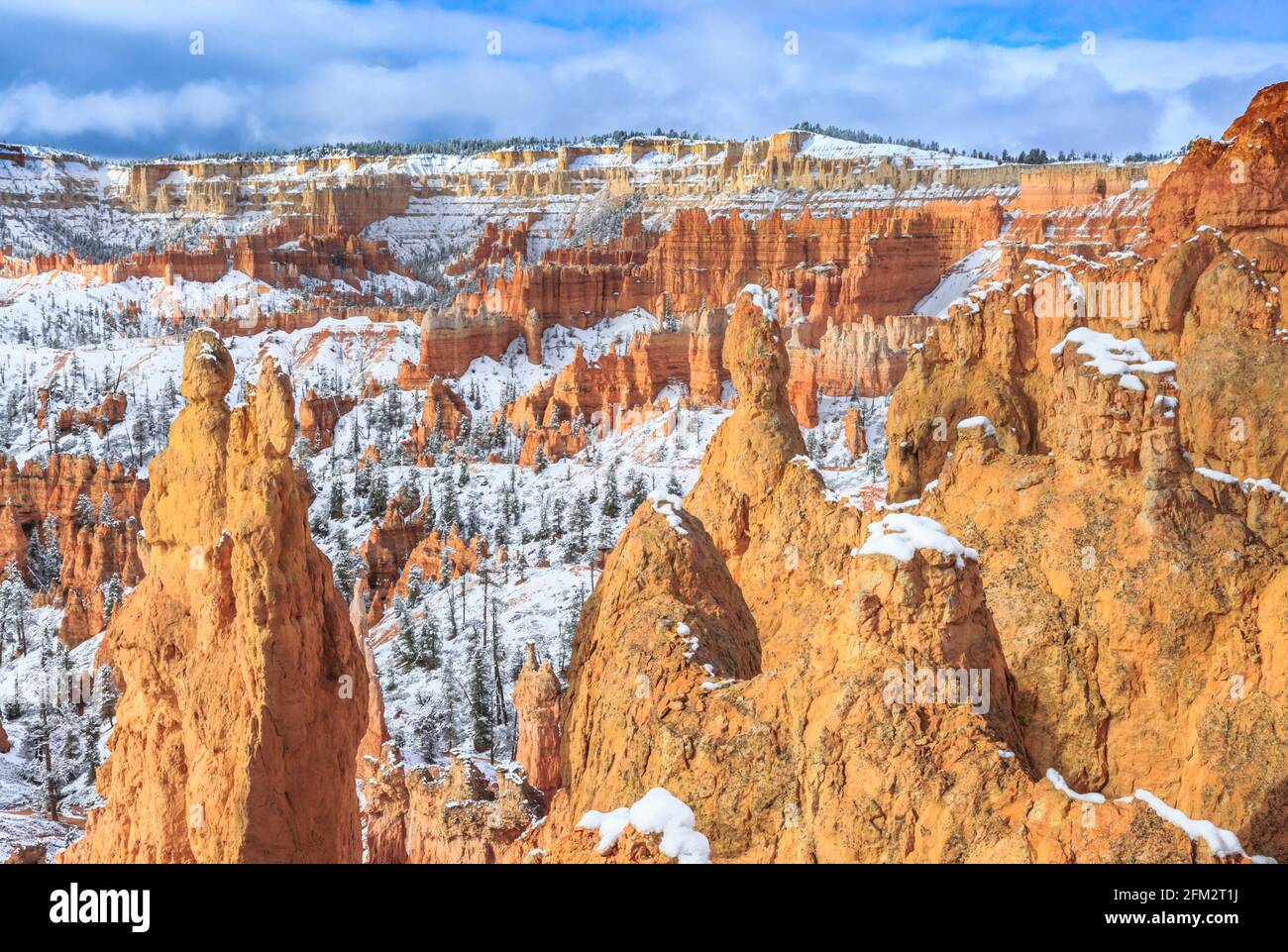 snow on hoodoos viewed from the queens garden trail in bryce canyon national park, utah Stock Photo