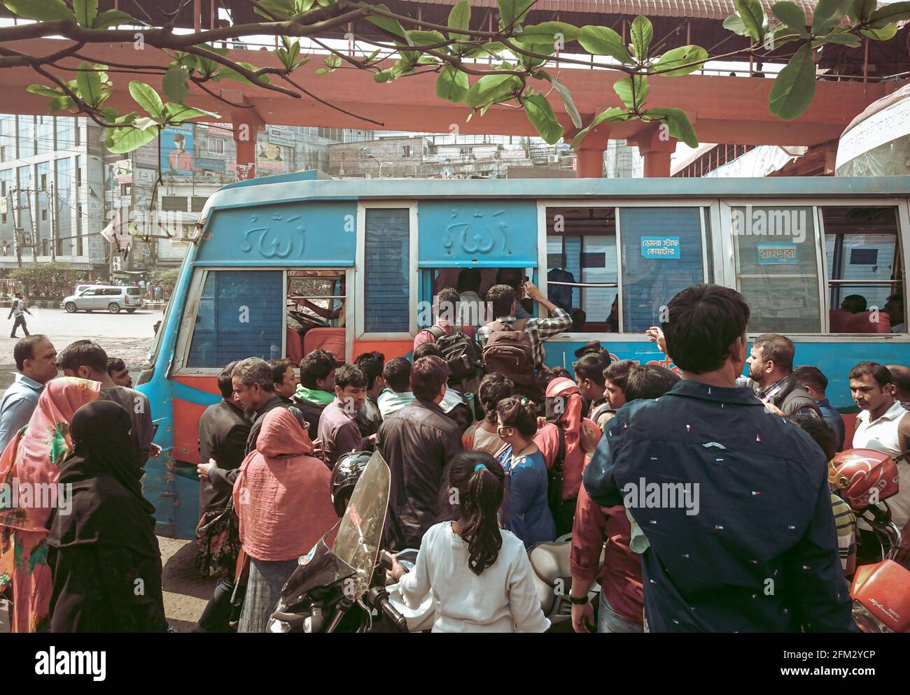 people's crowd in a public bus in the street of Dhaka . Stock Photo