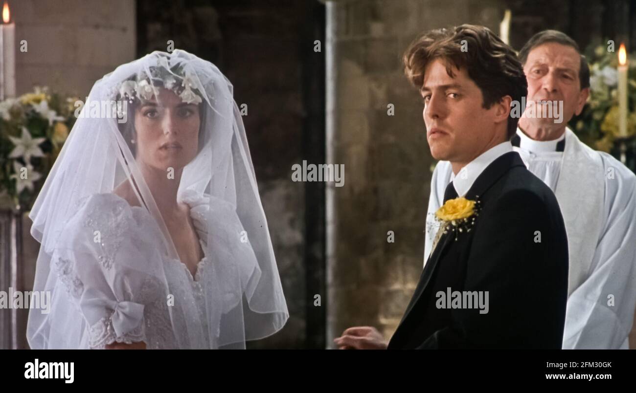 Anna Chancellor & Hugh Grant Film: Four Weddings And A Funeral (UK 1994)  Characters: Henrietta - Wedding Two & Charles Director: Mike Newell 20  January 1994 **WARNING** This Photograph is for editorial use only and is  the copyright of WORKING ...