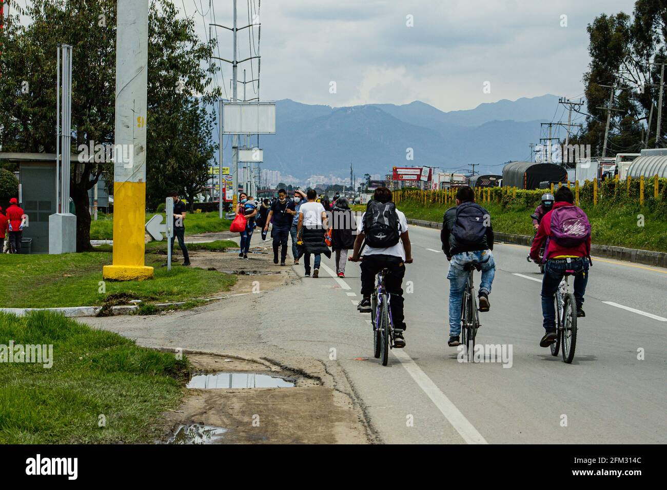 People mobilize by bicycle due to the blocking of trucks on the Medellín highway, Calle 80 in Bogotá and Cundinamarca for a protest against the Govern Stock Photo