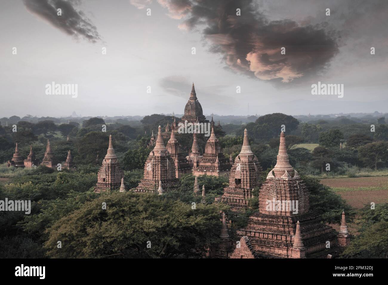 Stupas of ancient pagodas at sunrise, Bagan, Mandalay, Myanmar Stock Photo