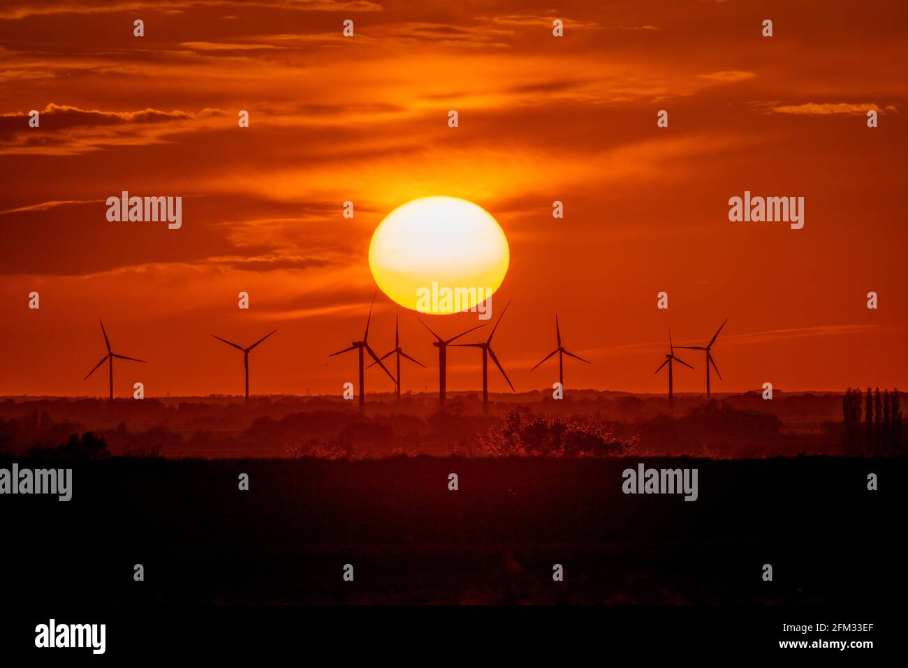 Sunset Behind Tick Fen Windfarm, Cambridgeshire Stock Photo - Alamy