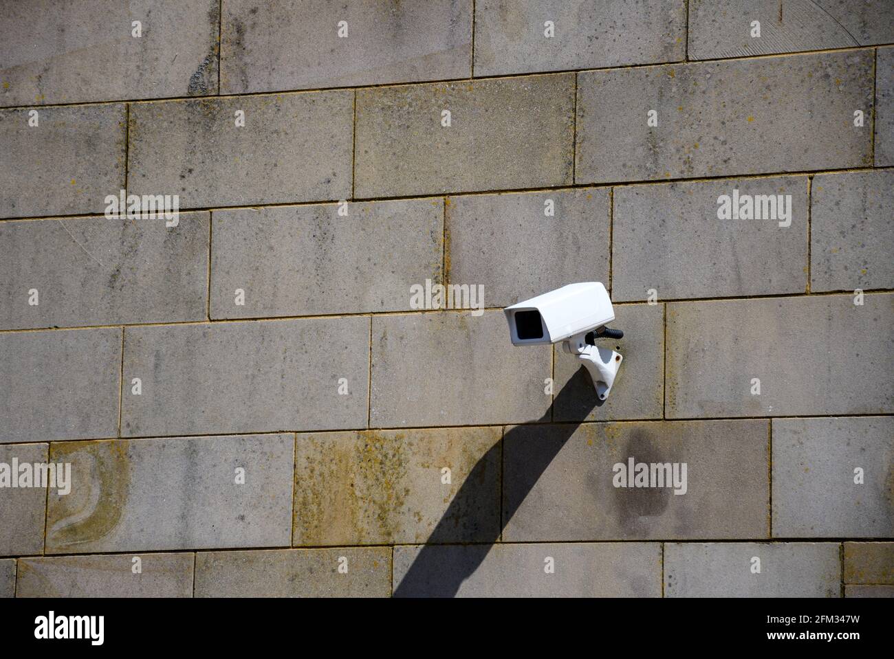 A CCTV camera mounted on a wall of Hastings station on Station Approach