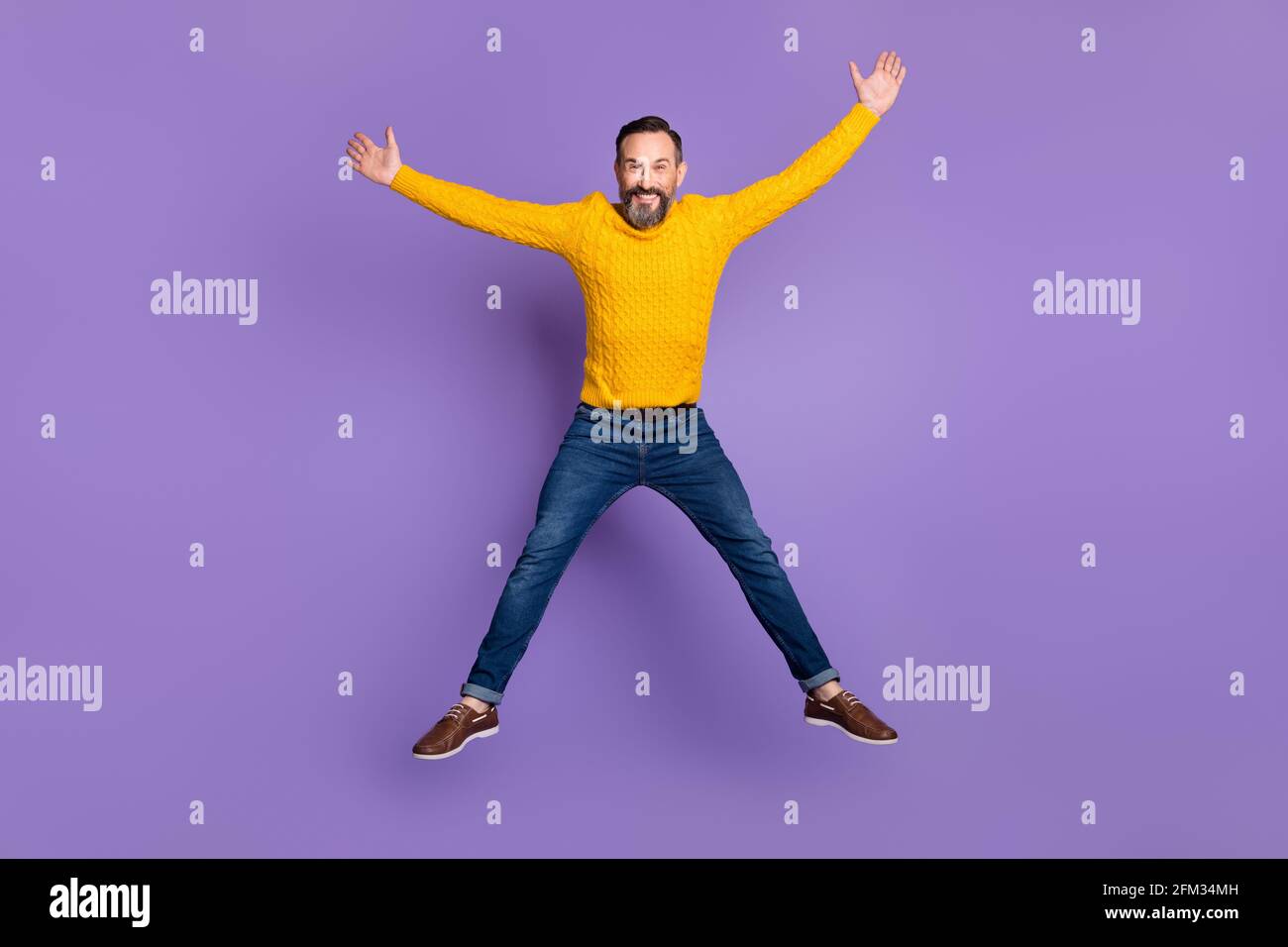 Full body photo of cheerful person jumping make star figure beaming ...